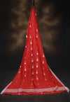 Red cotton saree with silver butis and an elegant silver border