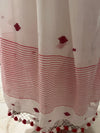 White cotton saree with red buti motifs and striped border